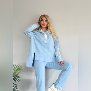 Light Blue Tracksuit with White Stripes